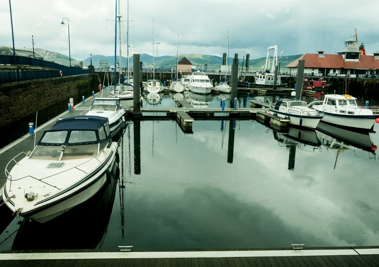 A harbour wall and moored boats